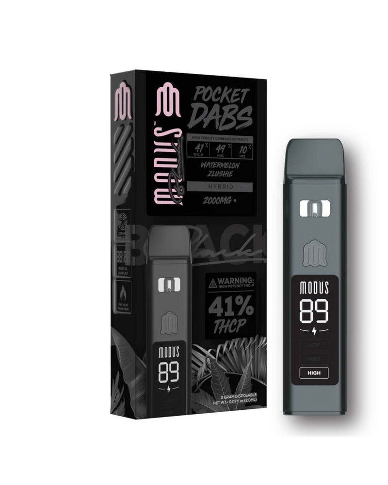 The packaging for the Modus Black Pocket Dabs Disposable | 2g showcases the vibrant Watermelon Zkittlez hybrid, boasting 2000mg and 41% THCP. It includes a warning label and a sleek image of the disposable vape pen, which uses ceramic slow heat technology to ensure optimal performance. The design is also marked with "89" and "High.