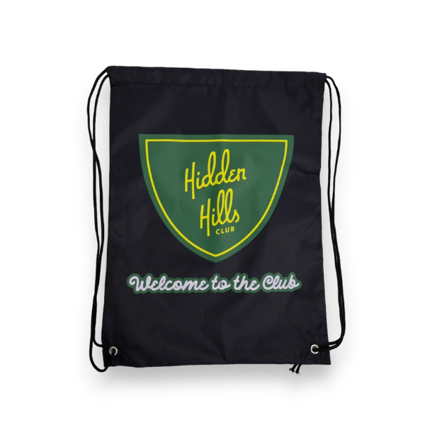 Black drawstring bag with the "Hidden Hills Club" logo in green and yellow and "Welcome to the Club" elegantly written below. Explore Everyday Delta's Mystery Swag to find quality goodies from top brands inside!.