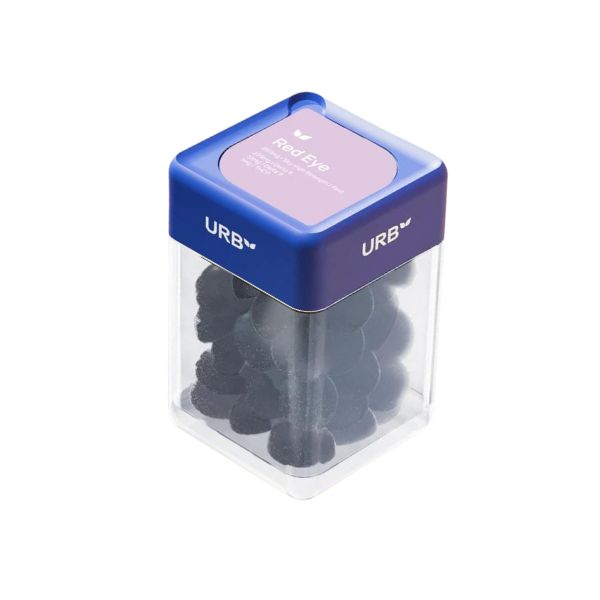 A clear square container with a blue lid labeled "Urb" and "Red Eye Skybites Gummies," filled with black round-shaped Delta-8 THC gummies, which are vegan, gluten-free, and non-GMO.