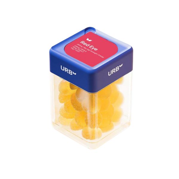 A clear container with a blue lid, labeled "Urb". The lid also displays the text "Red Eye" on a red background. The container is filled with yellow vegan, gluten-free, non-GMO Urb Red Eye Skybites Gummies.