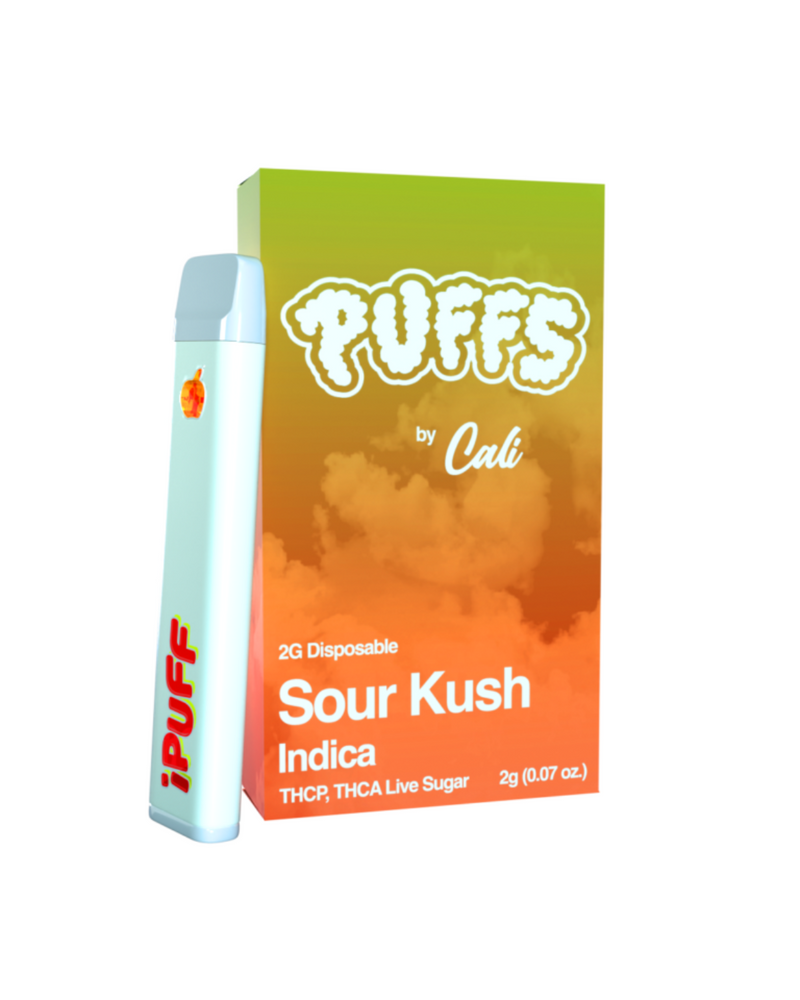 The Cali Extrax Puffs Disposable comes in stylish packaging, featuring a vape pen and a "Sour Kush Indica" box. This 2g product offers THC-P and THCA live sugar for an elevated experience.