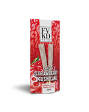 A red package labeled "Strawberry Kush Cake" features images of FVKD Hash Holez THCA pre rolls, infused cones, and strawberries. The brand name "FVKD" shines at the top, adding a touch of luxury with hints of Rainbow Sherbert Indica.