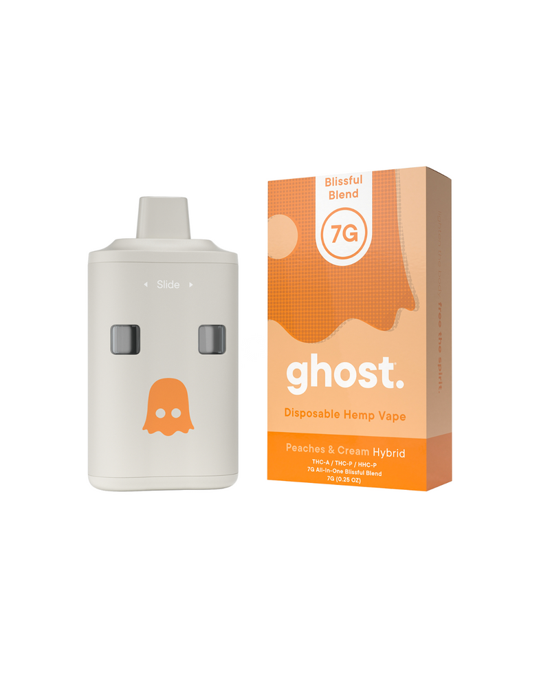 A Ghost Blissful Blend Disposable, featuring the "Peaches & Cream Hybrid" flavor and 7g capacity, is presented alongside its orange and white packaging. This dual tank device from Ghost provides a smooth and satisfying experience.