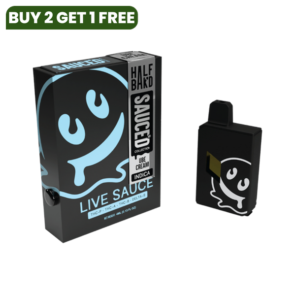 A black and blue Half Bak'd Live Resin Sauced Disposable | 4g box, part of the SAUCE'D Collection by Half Bak'd, sits next to a matching disposable vape featuring a smiling ghost logo and labeled as Ice Cream Indica THC-A live resin.