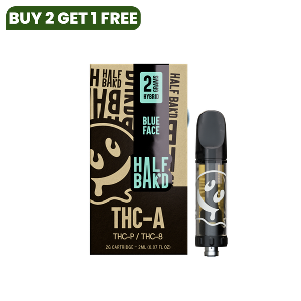 A black and gold Half Bak'd THC-A Cartridge | 2g with packaging labeled "Half Bak'd," "Blue Face," and "Hybrid." The packaging indicates it contains 2 grams of THC-A live resin and THC-P / THC-8, compatible with 510 vape batteries.