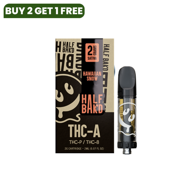 A box and cartridge of Half Bak'd THC-A Cartridge | 2g vaping product, labeled as 2 grams and Sativa. The packaging features a stylized face logo. Compatible with 510 vape batteries for seamless use.