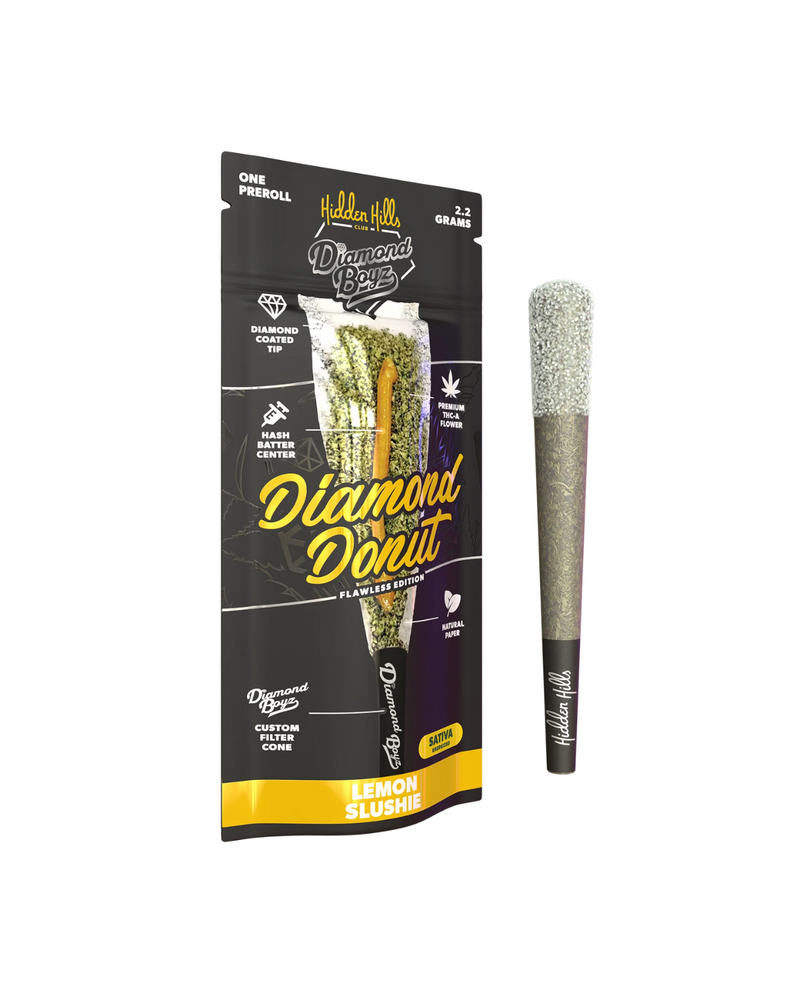A premium Hidden Hills Diamond Boyz Pre Roll | 2.2g stands upright beside its Hidden Hills packaging, highlighting product details and distinctive branding.