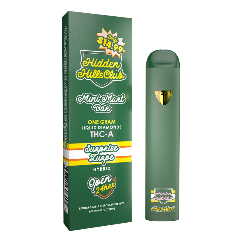 A green Hidden Hills Mini Mart THCA Disposable | 1g and its box. The box states "Only $14.99," "One gram premium THCA distillate," "Surprise flavors," "Hybrid," and "Open 24 hrs". The pen is rechargeable and disposable, crafted with the exclusive Hidden Hills Heady Blend.