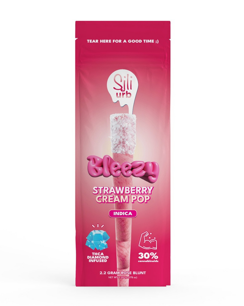 The pink and white packaging of Urb's "Sili x Urb Bleezy THCA Snow Capped Preroll" features a Rose Blunt, infused with 30% THC and THCA Liquid Diamonds, accentuated by an image of a blunt.