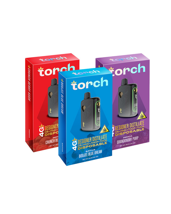 Three boxes of Torch Designer Distillate Disposables in red, blue, and purple packaging display the Torch branding and product specs. Each 4g pen delivers a live resin blend with a strong THC-A and THC-P mix for an enhanced experience.