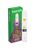 Next to the white Torch THC-A VVS Diamond Blend Disposable vape pen lies a vibrant green and purple box.